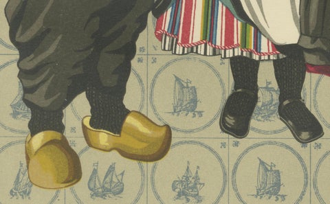 Children’s Traditional Dress from Urk with Embroidered Aprons and Silver Details, close-up 1