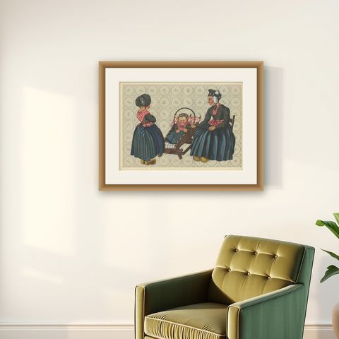 Charming Dutch Folk Art Print of Staphorst Mother and Children in Costume, 1932, shown framed on a wall