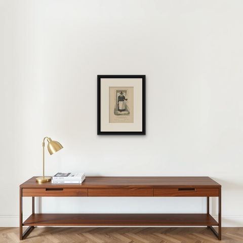 Antique Costume Print of a Farmer's Wife from Upper Austria, shown framed on a wall