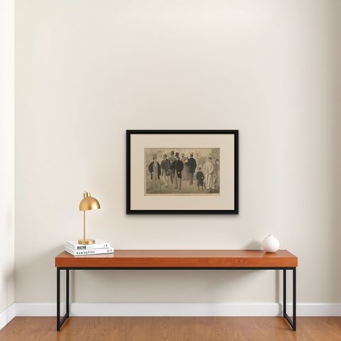 Antique Fashion Print of Males in Costume, 1864, shown framed on a wall