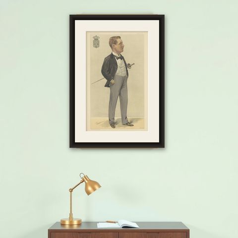 Royal Elegance: Prince Henry of Orleans, Fencing Nobleman, Vanity Fair 1897, shown framed on a wall