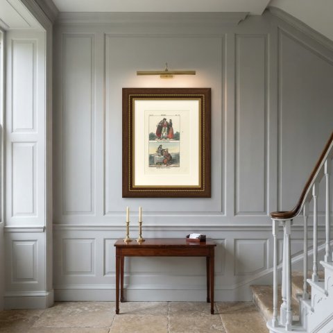 Fribourg Wedding Dress and a Bridal Couple of Schaffhausen, 1842, shown framed on a wall