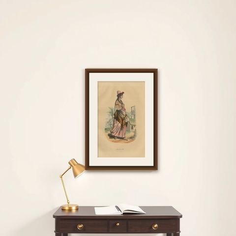 Jeune Fille Arabe in Traditional Attire from Wahlen's 1844 Lithographs, shown framed on a wall