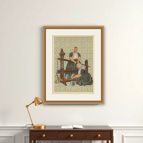 Walcheren Town Dress: Middelburg-Ambacht Women at a Cheese Press, 1932, shown framed on a wall