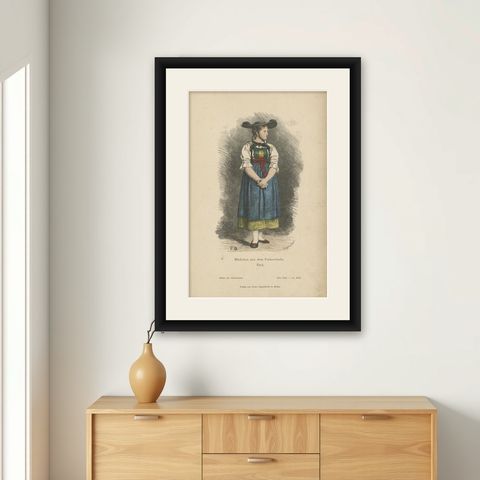 Antique Costume Print of a Girl from Val Pusteria, Tyrol, c.1880, shown framed on a wall
