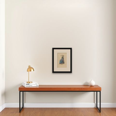 Seated Spanish Nobleman: The Visage of Authority, 1847, shown framed on a wall