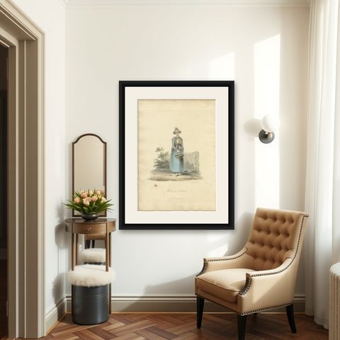 Antique Costume Print of a Frisian Woman from Hindelopen, the Netherlands, 1817, shown framed in a room