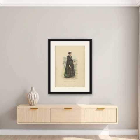 Antique Costume Print of a Girl from Brotterode 'Thuringia' by Lipperheide, 1880, shown framed on a wall