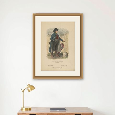 Antique Costume Print of a Farmer from the Region of Traunkreis by Lipperheide, shown framed on a wall