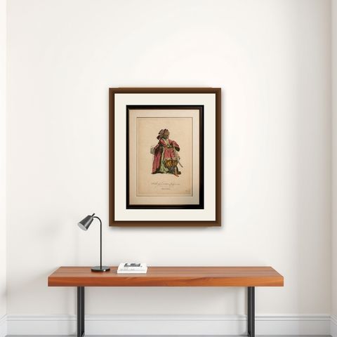 Antique Costume Print, Indian Chief, Exotic Dress & Arms, 1749, shown framed on a wall