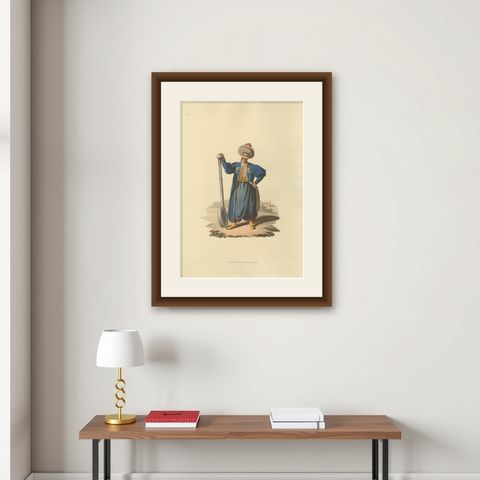 Antique Print of Ladle Bearer, The Military Costume of Turkey, 1818, shown framed on a wall
