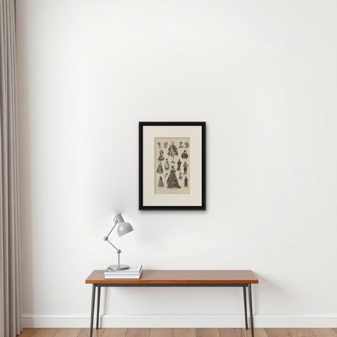 Antique Costume Prints of Tyrol, Paris, Berlin and Others, shown framed on a wall