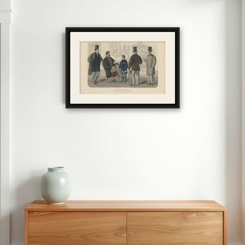 Antique Fashion Print of Men and Women Illustrating the Fashion Trends of 1865, shown framed on a wall
