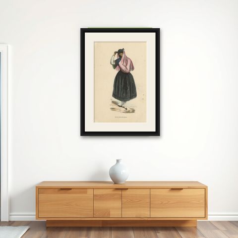 Antique Costume Print of a Young Lady in Bogotá by Wahlen, 1843, shown framed on a wall