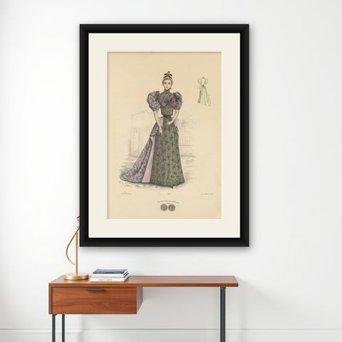 Victorian Evening Elegance: Opulent Fashion Lithograph Published in 1889, shown framed on a wall