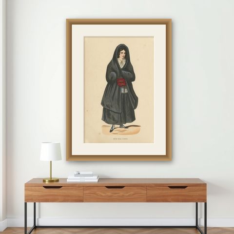 Antique Costume Print of a Young Lady in Porto by Wahlen, 1843, shown framed on a wall