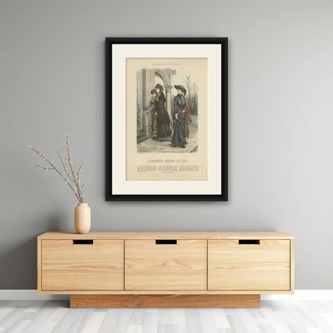 Antique Fashion Print by Marquart, 1881, shown framed on a wall